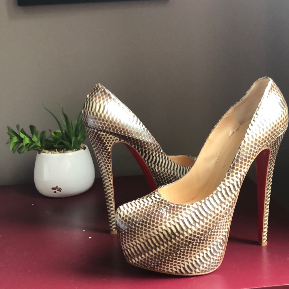 Gently used brown python Louboutin